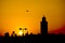 A stork silhouette on Marrakech Mosque