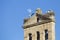 Storks in the bell tower of the convent of San Esteban in Salamanca, Spain