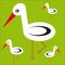 Storks family on green background