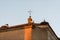 Storks perched on the roofs of a church in Medellin,