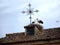 Storks on the roof of a rustic house