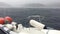 Storm in the Adriatic Sea nearby coast of Croatia, strong heavy rain, the stormy sky, a strong wind, lonely boat on