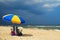 A storm approaches the beach