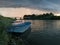 Storm arcus shaft and cumulonimbus cloud with heavy rain or summer shower, severe weather and sun glow behind rain. Landscape with