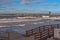 The storm on the Baltic Sea in February. A wooden breakwaters, promenade, lantern