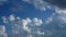 Storm clouds are brewing in this time-lapse clip. Beautiful blue sky with cumulus congestus clouds.