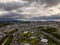 Storm clouds clear over small town at dawn