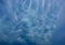 Storm clouds of fluffy puffy shape the beginning of a bubble-shaped thunderstorm, steel-gray color thunderstorm cell in the sky. h