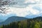 Storm clouds gathering over the foothills of the alps.