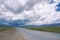 Storm clouds and highway