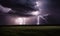 storm clouds and lightning over a field