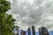 Storm clouds looming over high rise buildings