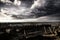 Storm clouds over beached shipwreck