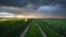 Storm clouds over field - Time lapse