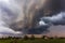 Storm clouds over field, tornadic supercell, extreme weather, dangerous storm