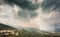 Storm clouds over the mountain village of Belgodere in Corsica