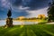 Storm clouds over a statue and Druid Lake at Druid Hill Park in