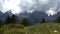 Storm clouds timelapse on wide majestic mountains