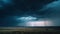 a storm is coming in over a field with a lone tree in the foreground and a single lightening in the distance with a dark blue sky