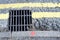 Storm Drain Grill and Double Yellow Painted Lines