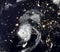Storm Laura over USA at night, view of tropical hurricane eye from space. Elements of this image furnished by NASA