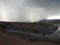 A storm moving across the desert