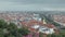 Storm is moving over Graz city in Austria in spring time, view from mountain, cityscape