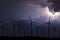 Storm Night Over Wind Farm. Energy and nature Night Sky.