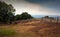 Storm over mountain pastures traditionally fenced