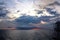 Before the storm. A painted view of storm and rain clouds and the sky above the sea horizon.