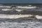 Storm at sea, big foamy waves