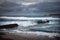 Storm Seas running over the harbour wall at Sennen Cove Cornwall UK