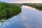 Storm sky over the river, artificial pond channel