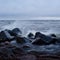 Storm sunset and rocks