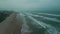 Storm wave splashing on a beach , Ocean Storm. Wide drone shot