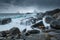 Storm waves on the beach in Lofoten Archipelago, Norway in the winter time