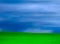 Storms and green grass grassy hills background