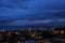Stormy clouds full of rain and city scape, horizon, cityscape