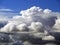 Stormy Clouds Gather Over Blue Sky.