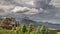 Stormy clouds over cottage in Tatra Mountains in summer, Zakopane, Poland