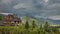 Stormy clouds over wooden cottage in Tatra Mountains, Zakopane, Poland