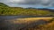 Stormy day at Loch Achray in autumn time