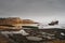 Stormy day at Santiago beach ship graveyard in Luanda, Angola