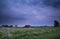 Stormy dusk on Dutch farmland