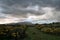 Stormy grey clouds over mountains