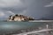 Stormy image of sveti stefan in montenegro