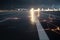 Stormy Landing: A View of an Airport Runway During Heavy Rain and Lightning