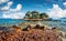 Stormy morning view of small islet on the Adriatic sea. Splendid summer scene of Sjekirica beach, Croatia, Europe. Beautiful world