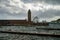 Stormy sea, high waves in old fisherman`s harbour with lighthouse in Cassis, Provence, France