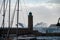 Stormy sea, high waves in old fisherman`s harbour with lighthouse in Cassis, Provence, France